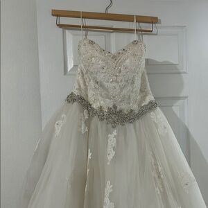 Elegant Cream Wedding Dress with Embellishments